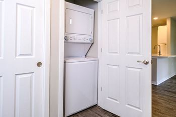 a small laundry room with a washer and dryer